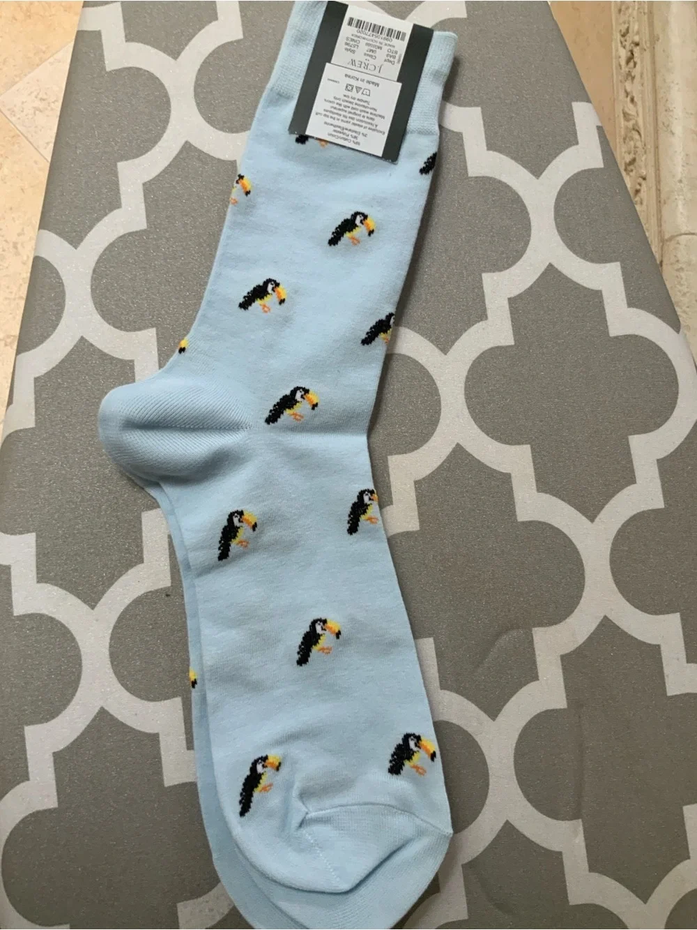 J.Crew toucan-print socks feature a light blue base